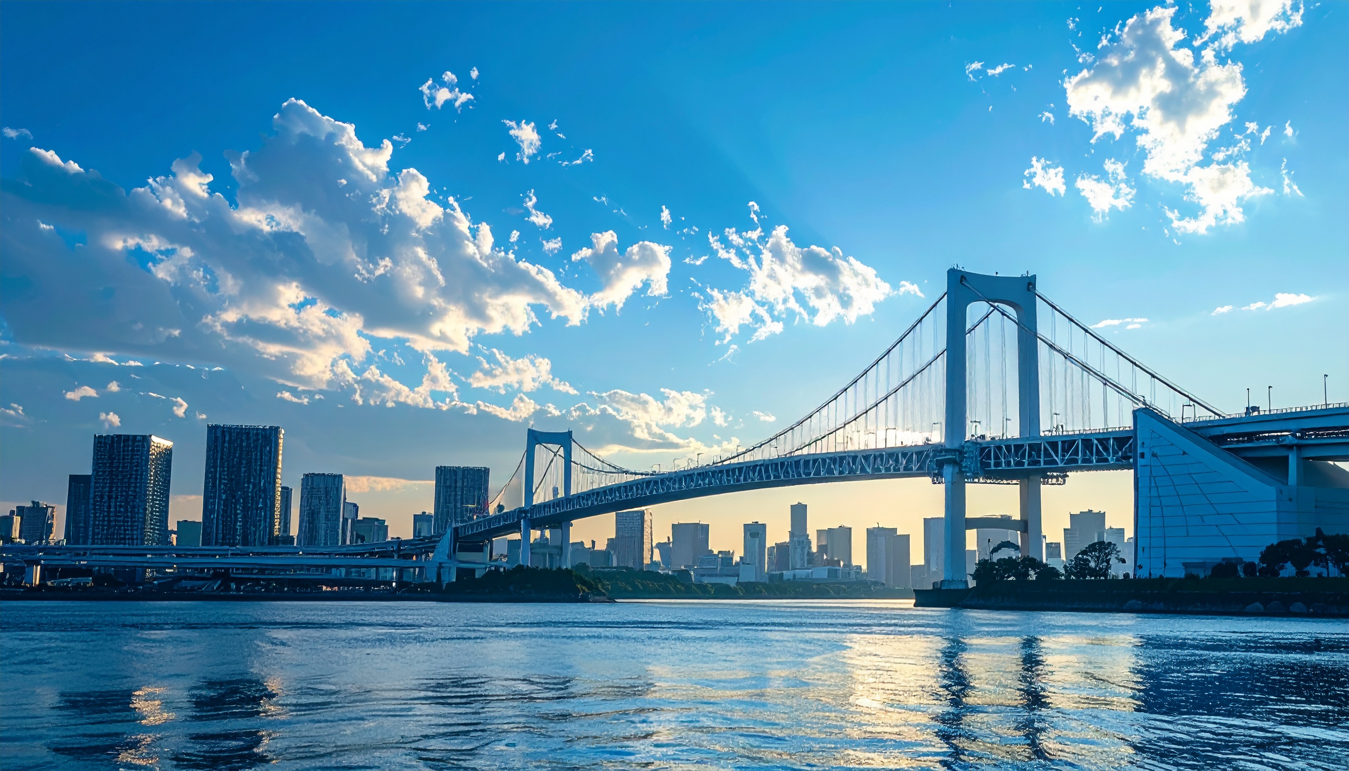 日本銀行 短期は強気、2025・26年度を上方修正、2027年度を下方